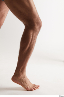 Simeon  1 calf flexing nude side view 0003.jpg